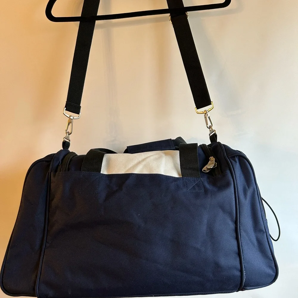 RUSSELL EXCLUSIVELY DISTRIBUTED BY PREMIUM BAGS,LLC LOGO NCCA FINAL FOUR DUFFEL